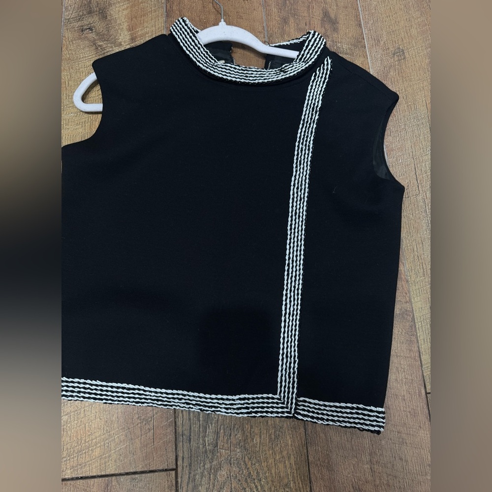 St. Andrew’s wool top. 12